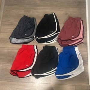 6 pairs of Nike shorts size large